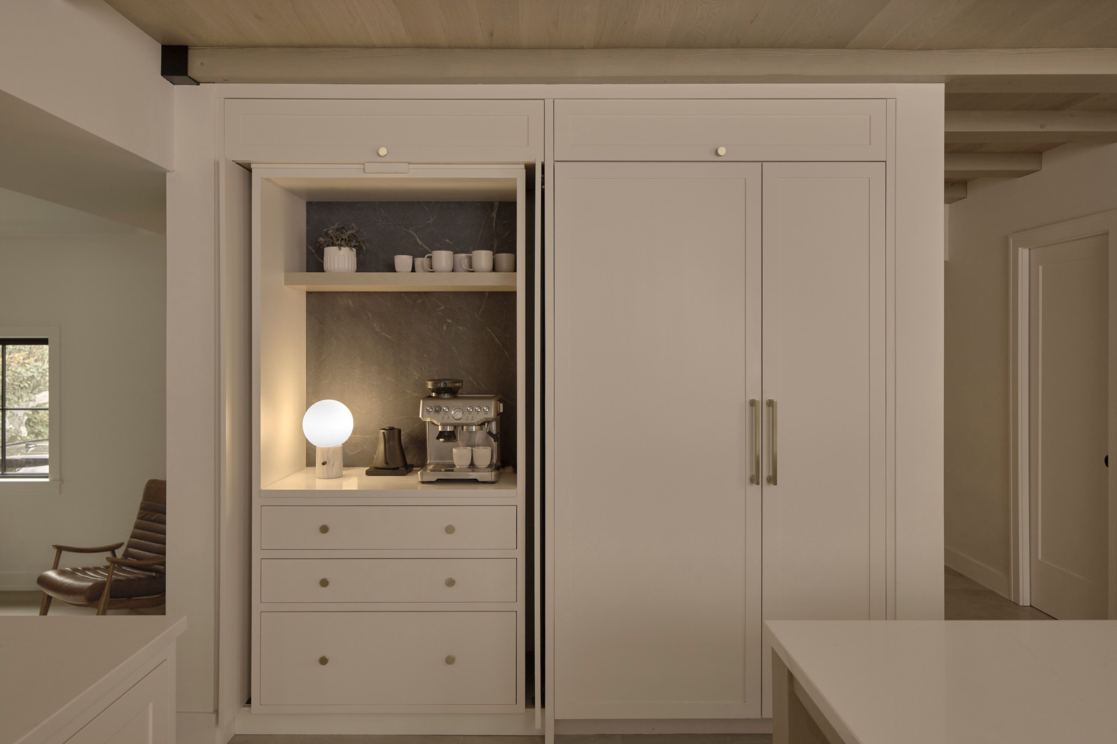 Custom inset kitchen cabinetry with hemlock beams and hidden coffee station — House on Kent