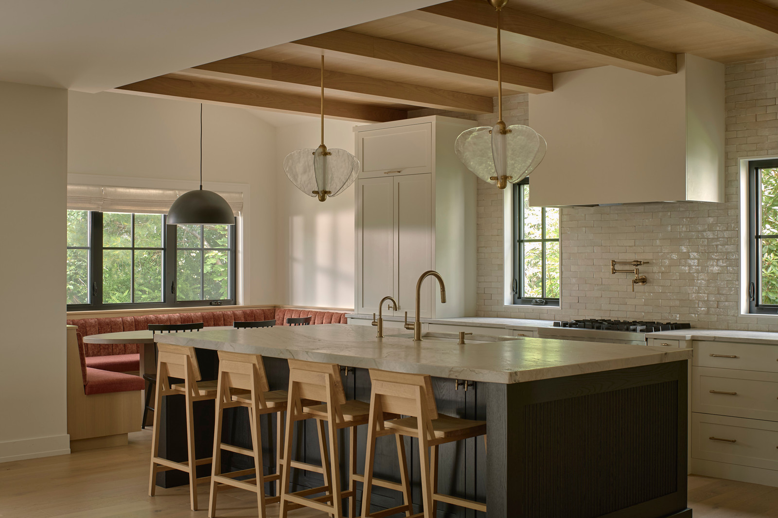 Open-concept custom kitchen cabinetry with quartzite counters and timber ceiling — House on Peter Lowe