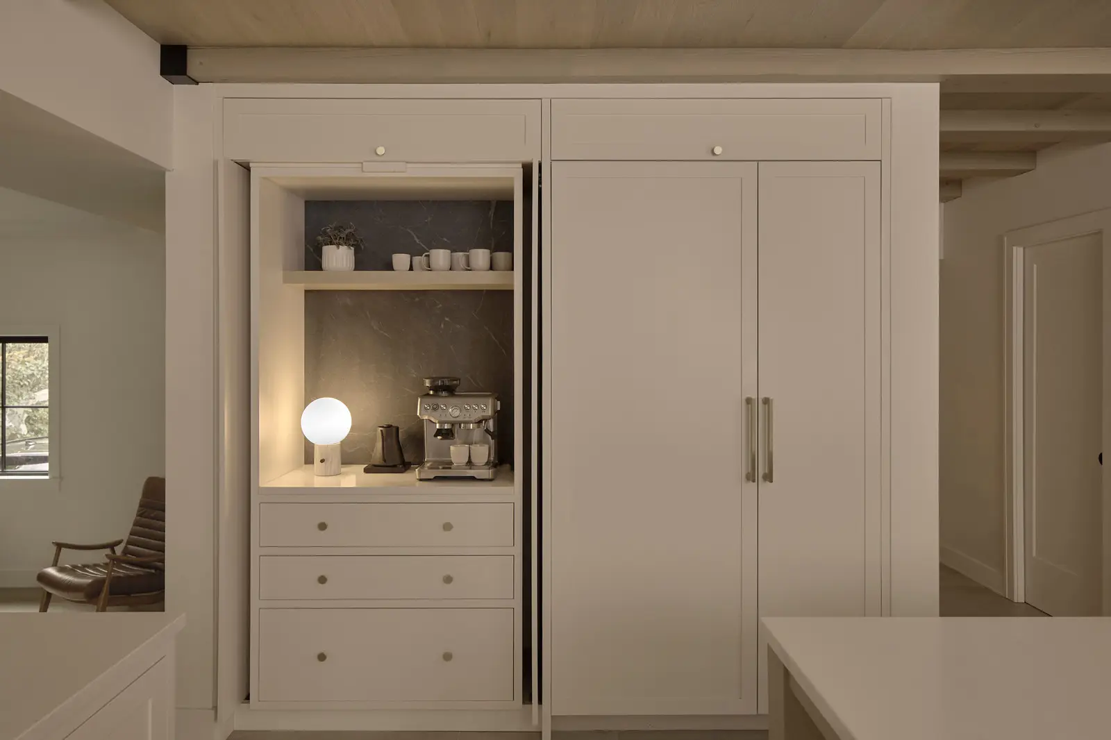 Custom inset kitchen cabinetry with hemlock beams and hidden coffee station — House on Kent