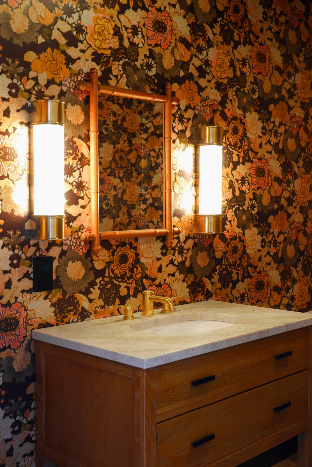 Coastal Cottage custom overlay cabinetry with painted shaker doors and brass hood